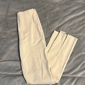 No boundaries tan skinny dress pants, with ankle slit